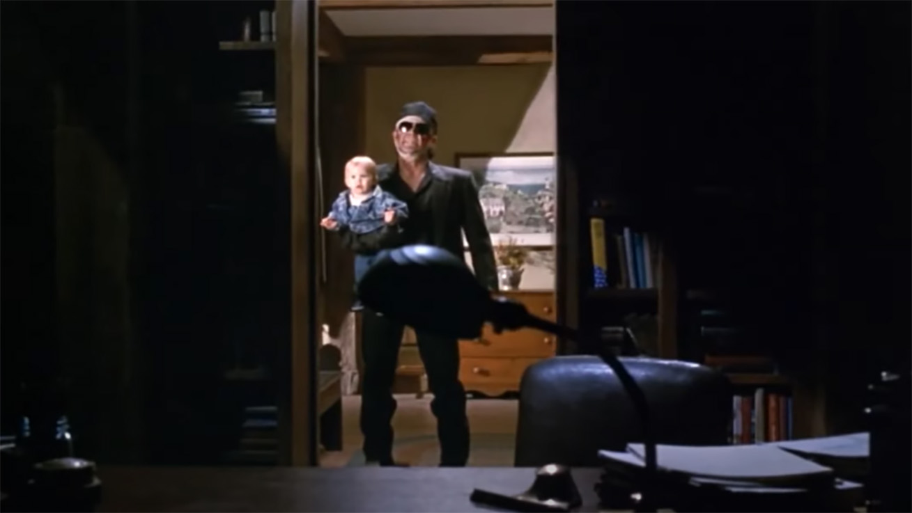 Timothy Hutton holding a baby in The Dark Half
